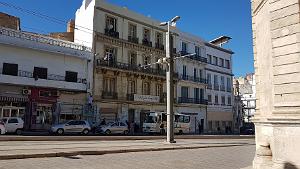 ORAN BD JOFFRE A DROITE UNE AILE DU THEATRE ET LE COIN DE LA MAISON DARMON